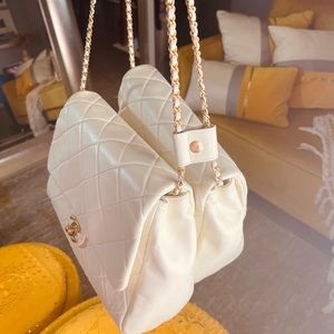 Authentic Chanel Double Quilted Lambskin Side-Pack Crossbody Bag